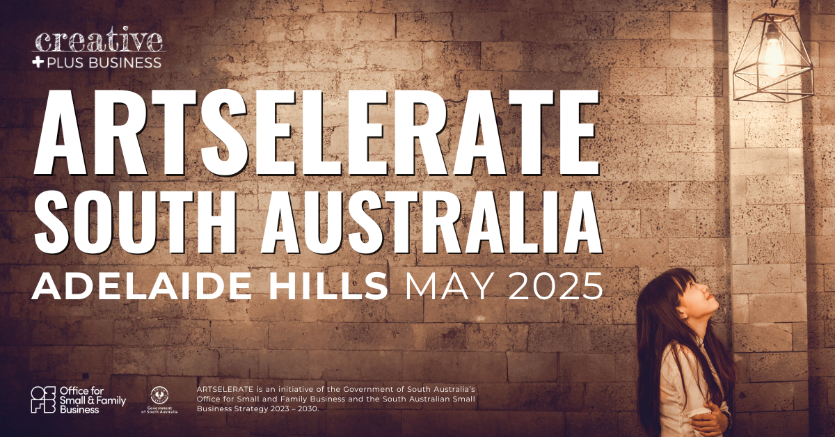 A horizontal poster with a textured, brick-like background featuring a young woman looking up at a hanging lightbulb on the right. The text "ARTSELERATE SOUTH AUSTRALIA ADELAIDE HILLS MAY 2025" is prominently displayed in bold, white letters. The "creative + PLUS BUSINESS" logo is in the top left corner, and the "Office for Small & Family Business" logo is in the bottom left. A brief description of the "ARTSELERATE" initiative is in the bottom right corner.